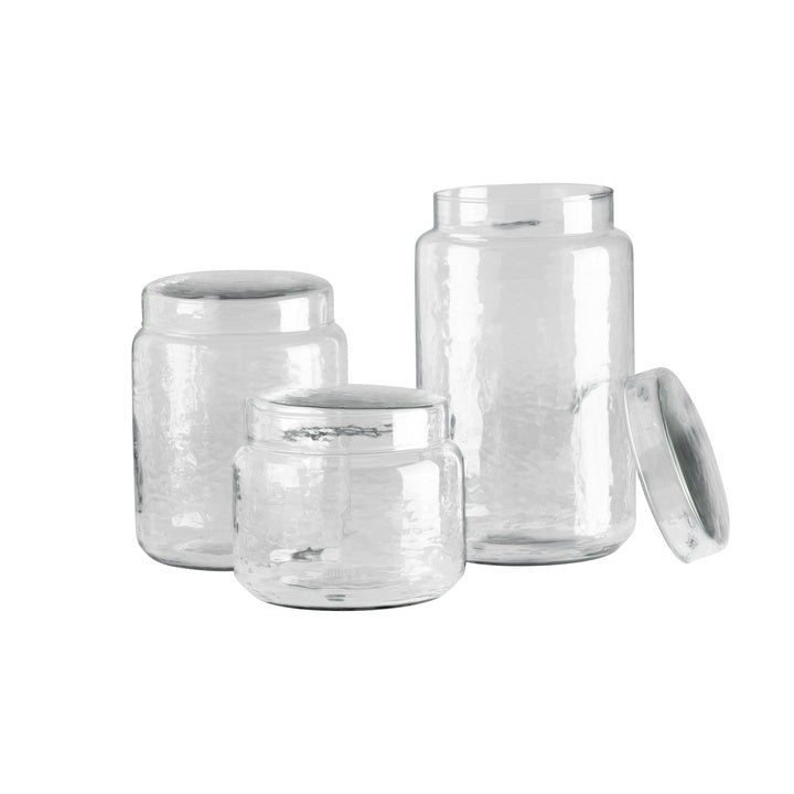 Rundt opbevaringsglas med låg i klart, mundblæst og hamret glas med let ujævn overflade, Ø 12 × H 16 cm