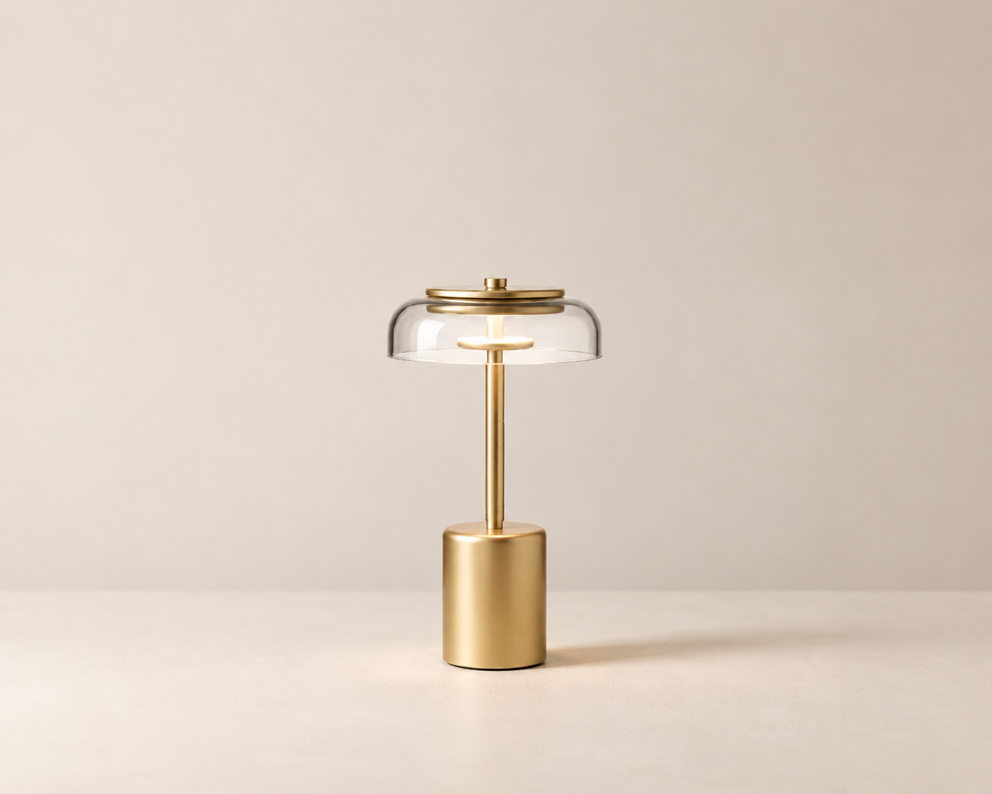 Nuura - Blossi Table Mini Portable – Nordic Gold/Clear